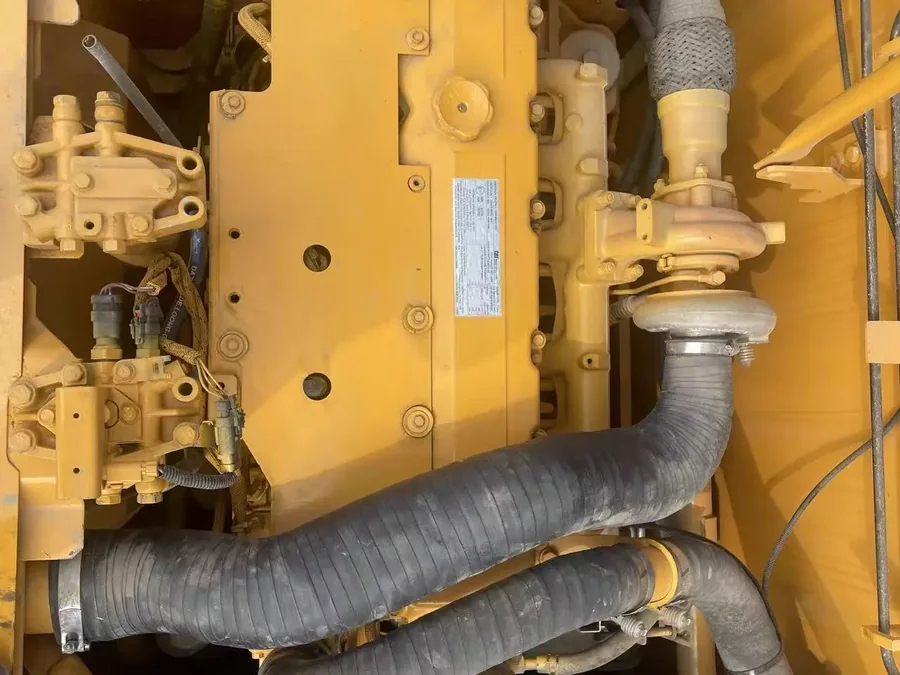 Used excavator engine compartment close-up