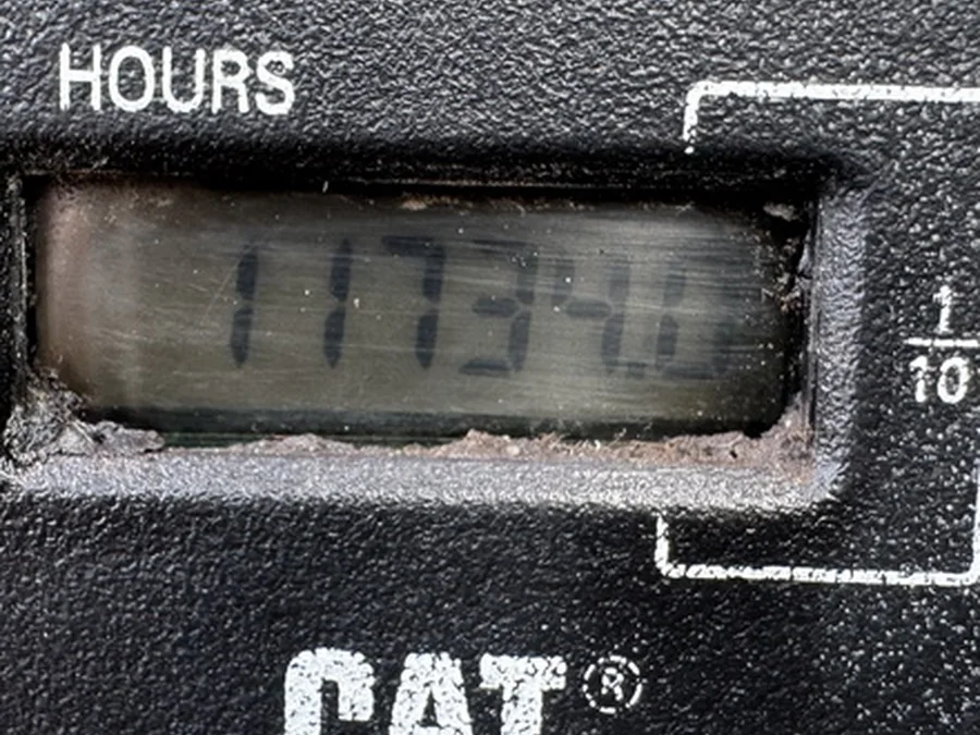 Used excavator hour meter close-up